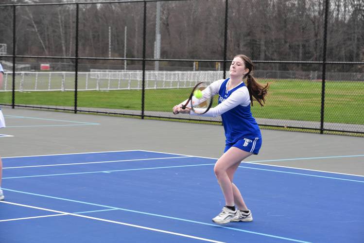 Turners Falls’ Regan Marshall returns a volley in No. 1 doubles against Frontier on Wednesday in South Deerfield. 