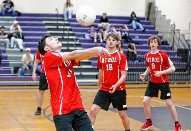Athol’s Colin Mason (11) passes against Holyoke in the second set Friday in Holyoke.