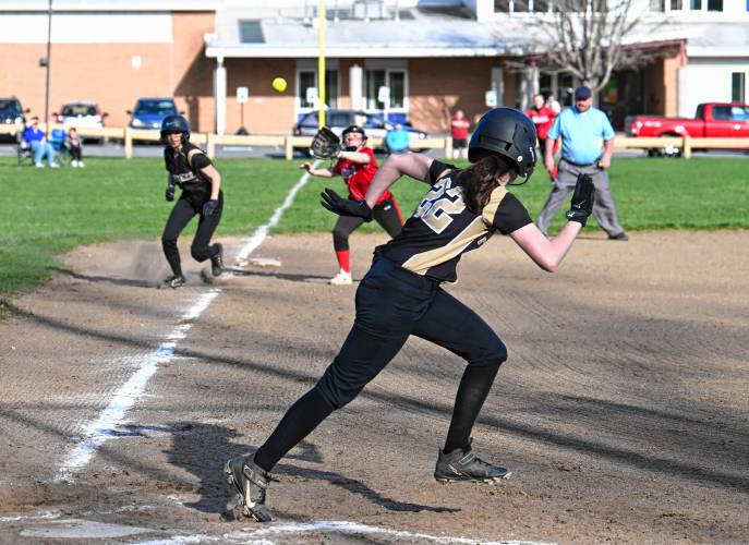 Pioneer’s Erin Killay heads to first base after hitting a line drive toward Athol third baseman Abby Lutz in Northfield on Tuesday. 