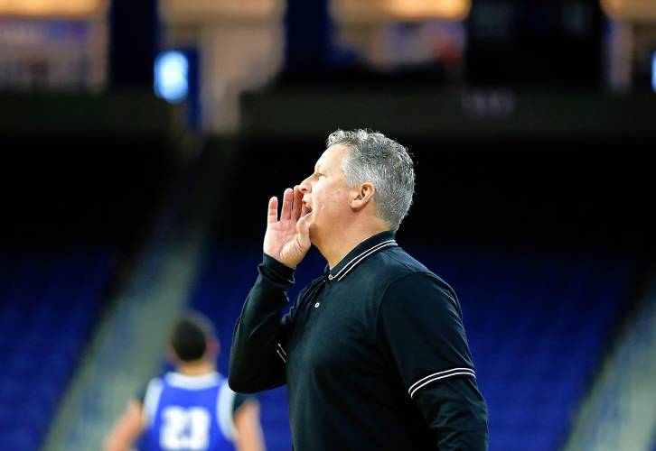 Pioneer head coach Scott Thayer calls out a play against Hopedale in the fourth quarter of the MIAA Div. 5 state championship Saturday at the Tsongas Center in Lowell. 