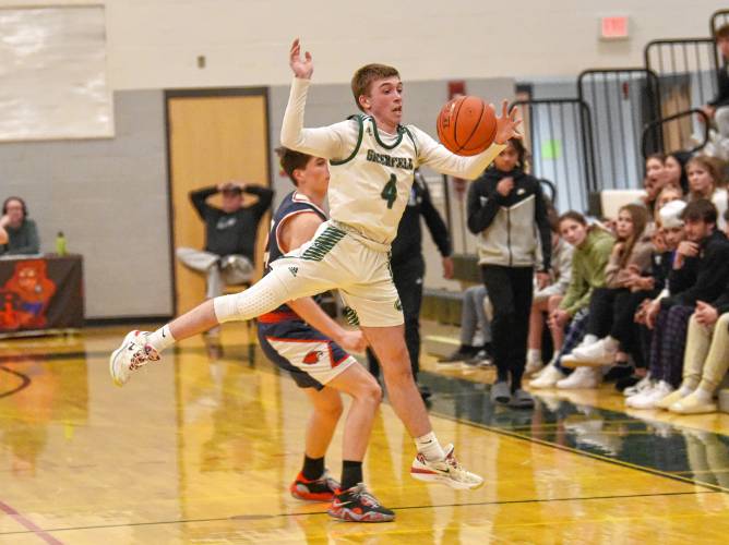 Greenfield’s Caleb Murray (4) steals a pass against Frontier during Hampshire League South action at Nichols Gymnasium in Greenfield on Tuesday evening.