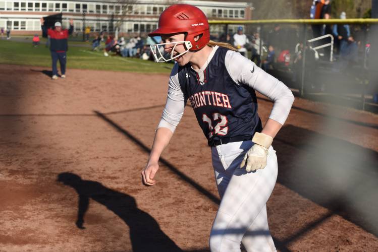 Frontier’s Delaney Fifield (12) smiles after scoring the game-winning run against Turners Falls in a 2-1 victory on Wednesday at Zabek Field in South Deerfield.