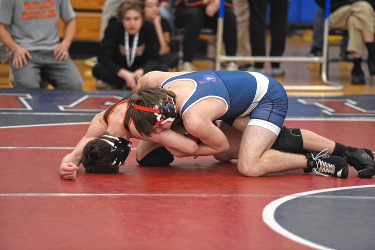 Mahar's Colby Chaisson (top) competes against Wayland's Maxwell Berkowitz at the MIAA Div. 3 Central Mass. Championship at Ashland High School on Saturday. 