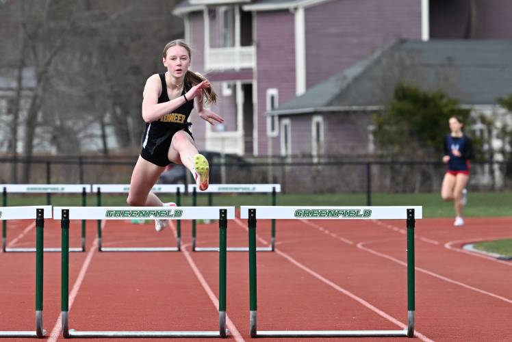 Pioneer’s Emmanuelle Flagollet  wins the girls 400 meter hurdle race at Greenfield High School on Wednesday. 