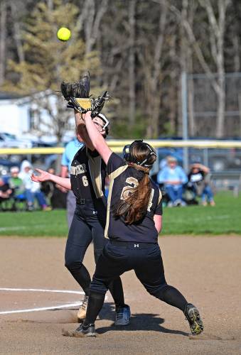 Pioneer’s Jacobia Tyminski pulls in an infield fly backed up by Maggie Tsipenyuk against Athol in Northfield on Tuesday. 